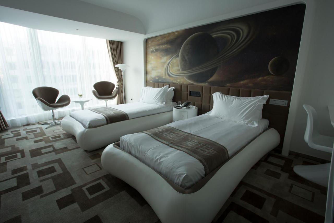 Guangzhou Planet Hotel Zimmer foto